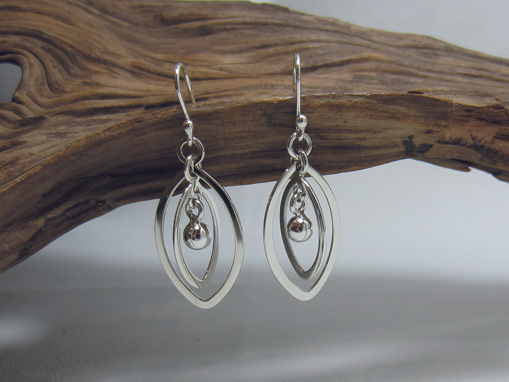 These sterling silver drop earrings are 38mm long and 19mm wide at their widest point. 925 Silver Canterbury