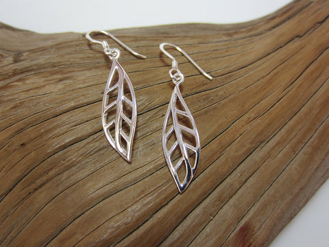Sterling silver earrings. Nice twisted leaf design which is 25mm long. 925 Silver Canterbury