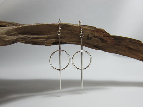 Stylish, sterling silver 60mm long earrings featuring a 24mm diameter circle. 925 Silver Canterbury