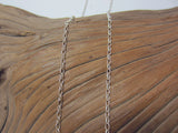 This fine, sterling silver belcher chain works well with more traditional pendants, ideal with a smaller locket or cross. It is 1.84 mm wide. 925 Silver Canterbury