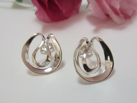 Curvy, sterling silver studs measuring 17mm across at their widest point. 925 Silver, Canterbury