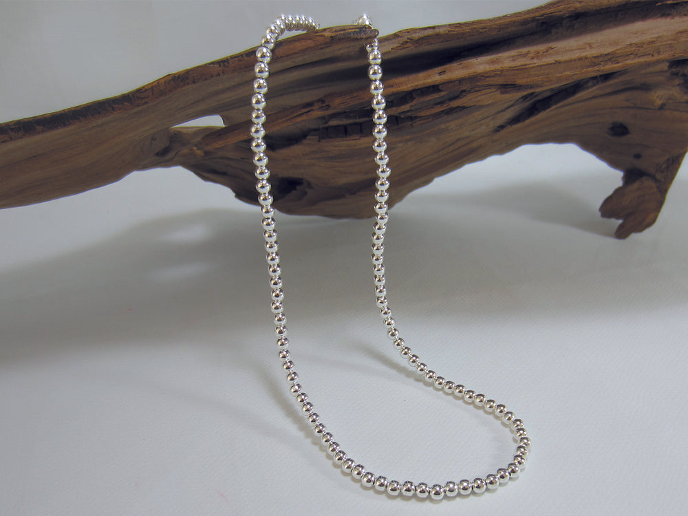 Nice everyday necklace made up of 4mm sterling silver beads. With an extender chain the necklace can be worn between 42 and 46 cms and weighs just over 11 grams.