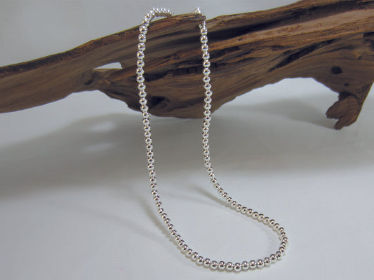 Nice everyday necklace made up of 4mm sterling silver beads. With an extender chain the necklace can be worn between 42 and 46 cms and weighs just over 11 grams.