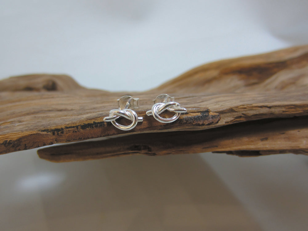 Cute little sterling silver knot studs which are 10mm wide. 925 Silver Canterbury