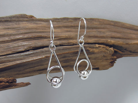 caged bead drops. Nice curves - these sterling silver earrings are 20mm long