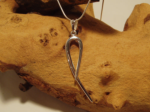 Simple, elegant sterling silver pendant which is about 50mm long excluding the bail. It is shown here on a fine snake chain. 925 Silver Canterbury