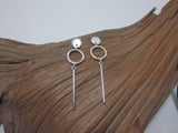 Simple and stylish sterling silver geometric drop earrings. They are 40mm long and have a post and butterfly fitting.