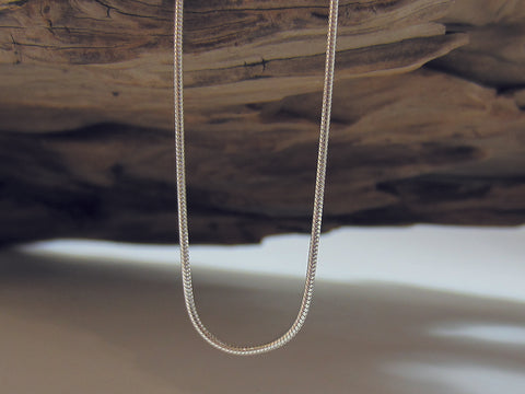 A great quality, sterling silver Italian snake chain that is really versatile and looks great with lots of different pendants. It is  0.9mm in diameter.