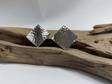 The hammered finish of these larger sterling silver studs really makes them stand out, they measure 26mm across. 925 silver Canterbury
