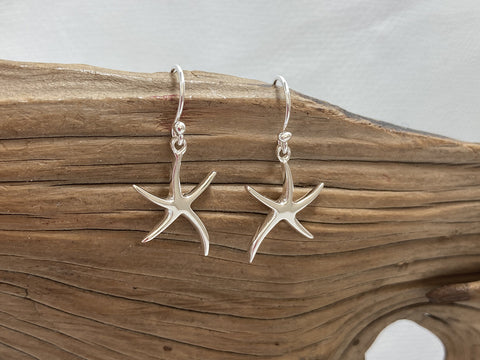 Sterling silver starfish drop earrings which measure 15mm across and about 20mm high. 925 Silver, canterbury