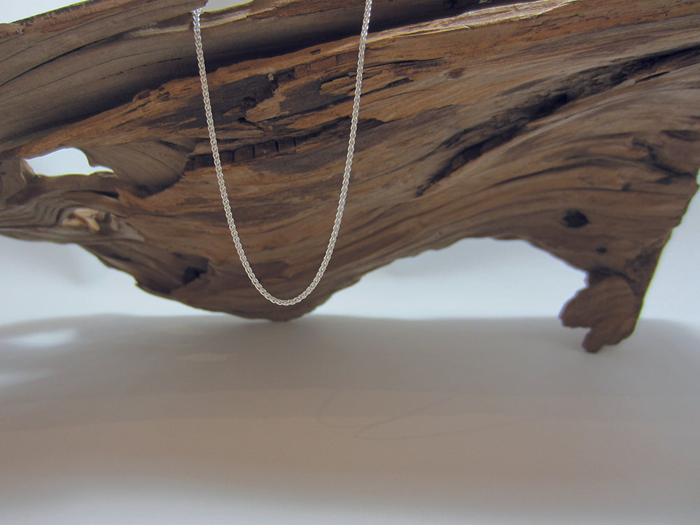 Similar in style to a rope chain, this is a versatile sterling silver chain that looks great with lots of different pendants. It is also very robust so it great for longer lengths.