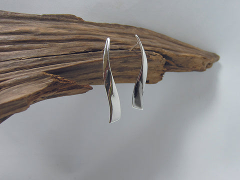 These sterling silver earrings have a flowing ribbon feel to them, they are 40mm long and 5mm wide. 925 Silver Canterbury